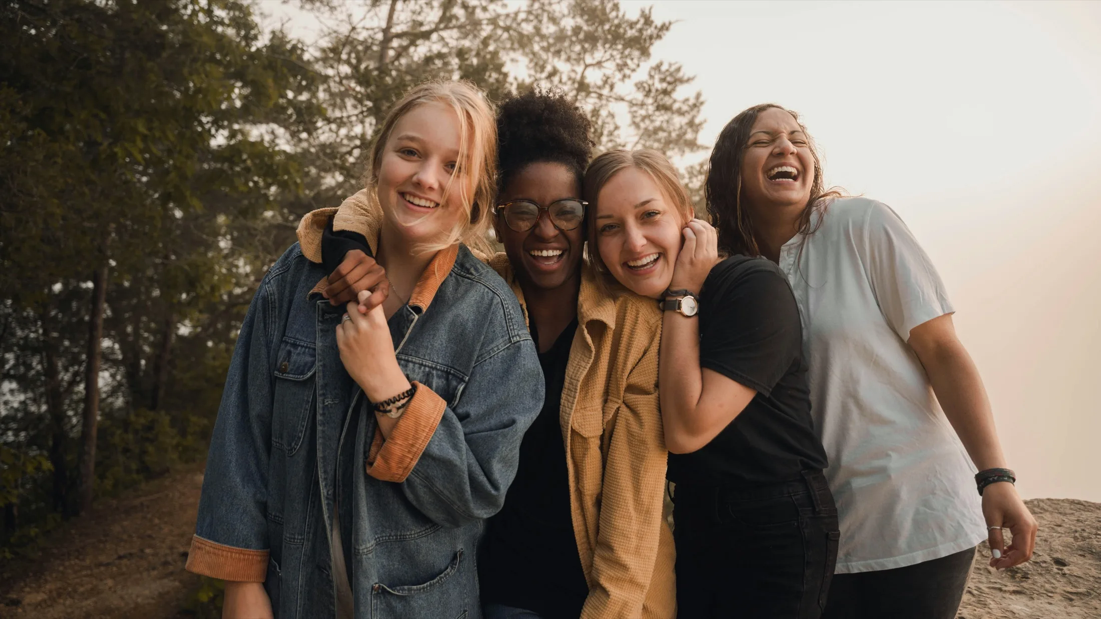 Girls laughing together outdoors